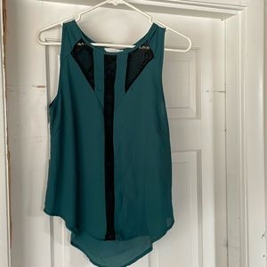 Green sleeveless blouse